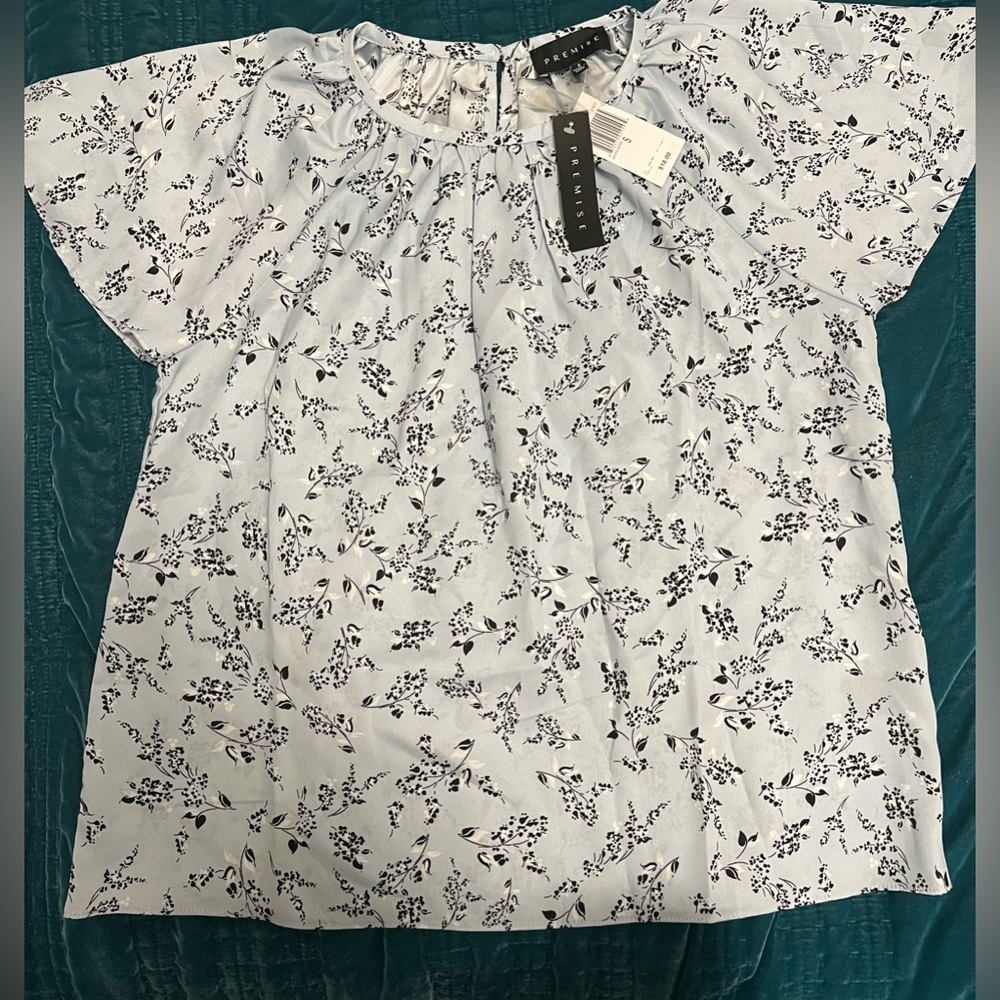 NWT PPREMISE blouse. 100% polyester and a silky on the inside!